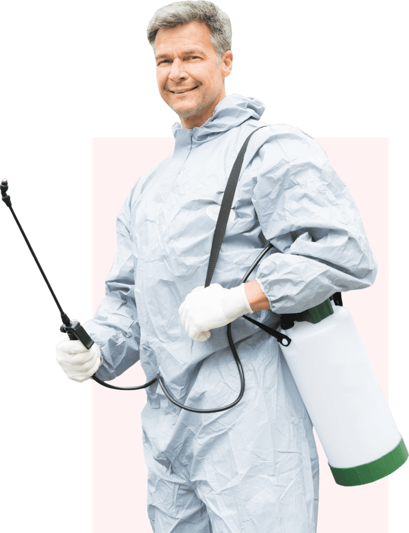 Man in protective suit with sprayer.